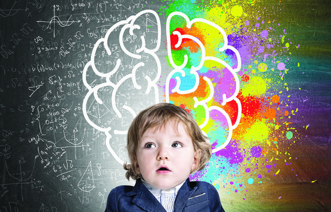 Little boy and a colorful brain sketch